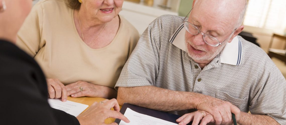 Older Couple Reviewing Trust